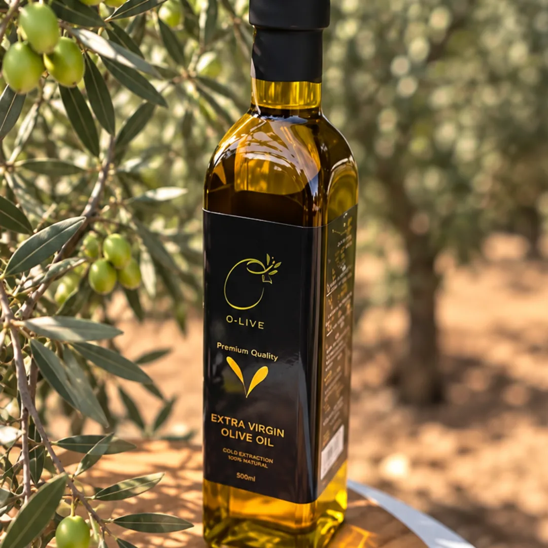 An O-Live bottle among the olive trees